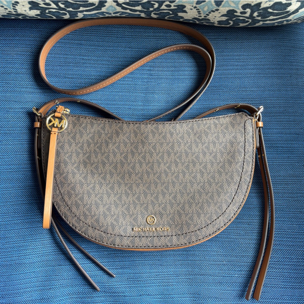 Michael Kors brown leather cross body bag.